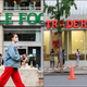Left: exterior of a Whole Foods; right: exterior of a Trader Joe's